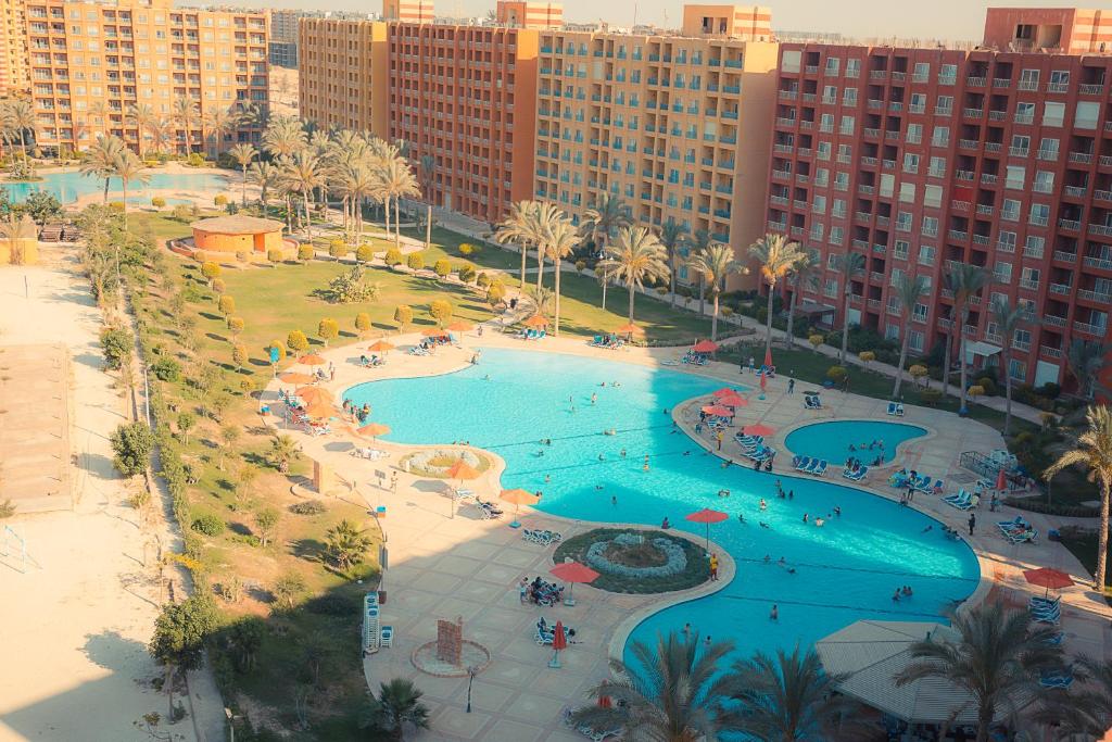 قرية بورتو مارينا جولف الساحل الشمالي عامر جروب – Golf Porto Marina North Coast Village