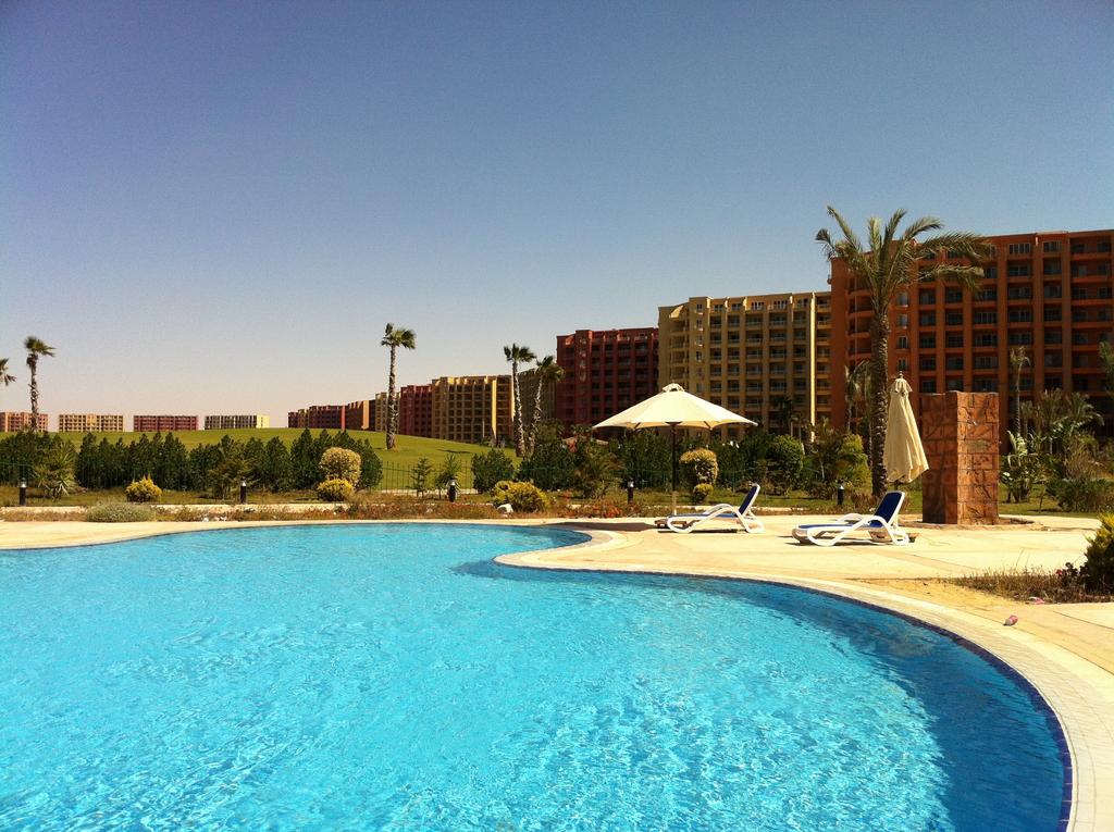 قرية بورتو مارينا جولف الساحل الشمالي عامر جروب – Golf Porto Marina North Coast Village